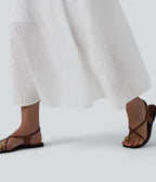 Robe mi-longue fluide col V sans manches avec nœud au dos