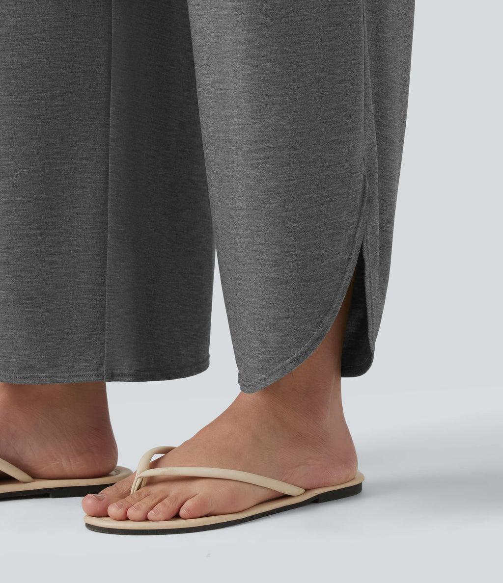 Pantalon décontracté taille haute gainant avec ourlet arrondi et poches