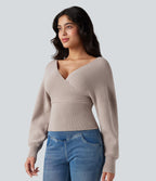 Pull col V manches chauve-souris longues à découpes