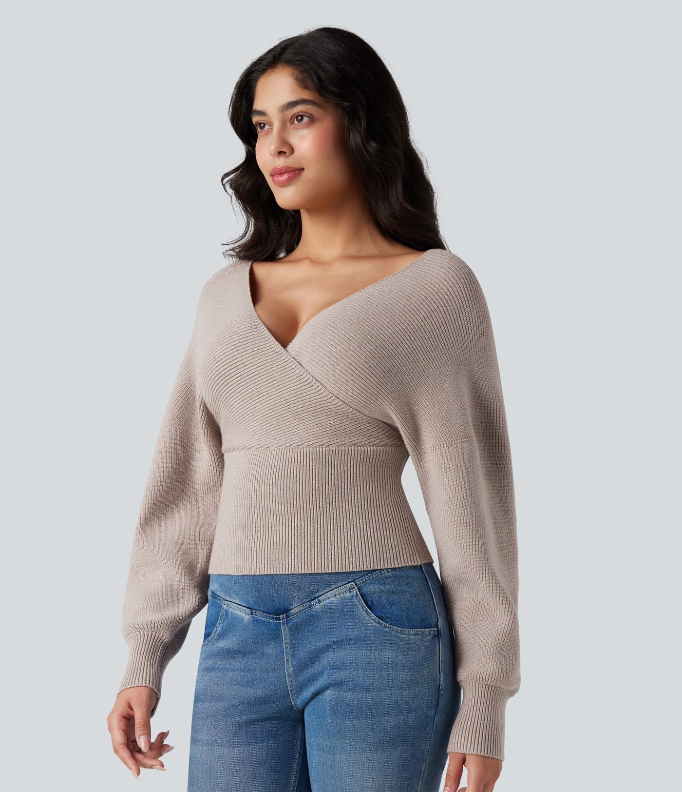 Pull col V manches chauve-souris longues à découpes