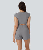 Combinaison de yoga Softlyzero™ Airy avec col U, manches courtes et poches latérales - Édition Easy Peasy