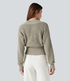 Pull tailleur col V ajouré manches longues