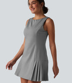 Robe mini habillée col bateau sans manches à rayures et détails plissés
