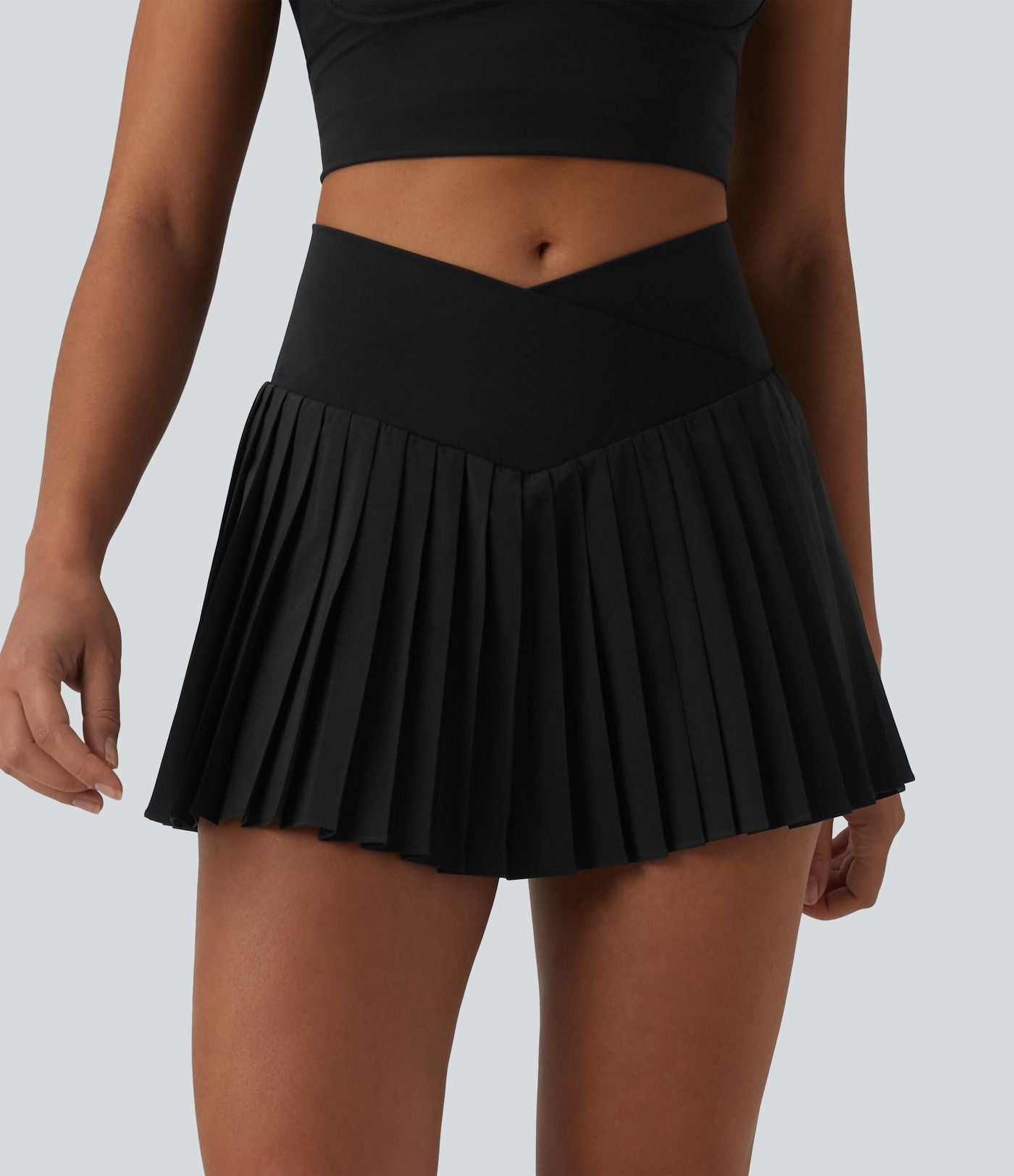 Breezeful™ Jupe-short tennis mini 2-en-1 plissée séchage rapide taille haute croisée avec poches