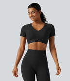 Haut de sport court Halara UltraSculpt™ à col V avec ourlet croisé, manches courtes, coussinets amovibles, bonnets E à G