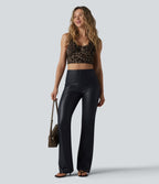 Pantalon décontracté taille haute, coupe bootcut, en PU extensible avec poches