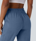 Pantalon capri effet lin taille haute avec poches zippées