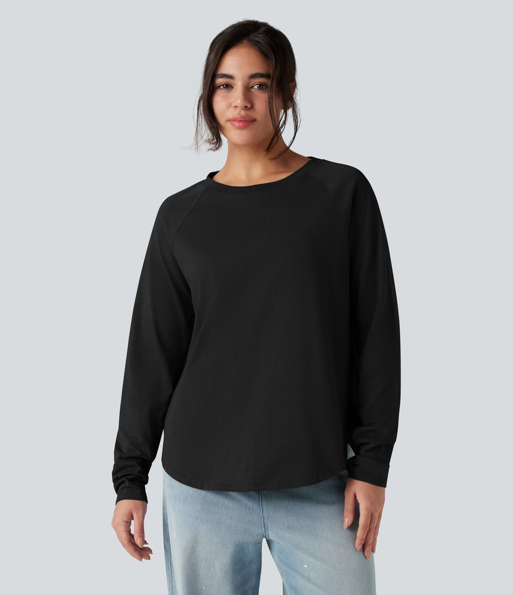 T-shirt décontracté en coton à col rond, manches longues raglan avec passants pouces et ourlet arrondi, coupe ample