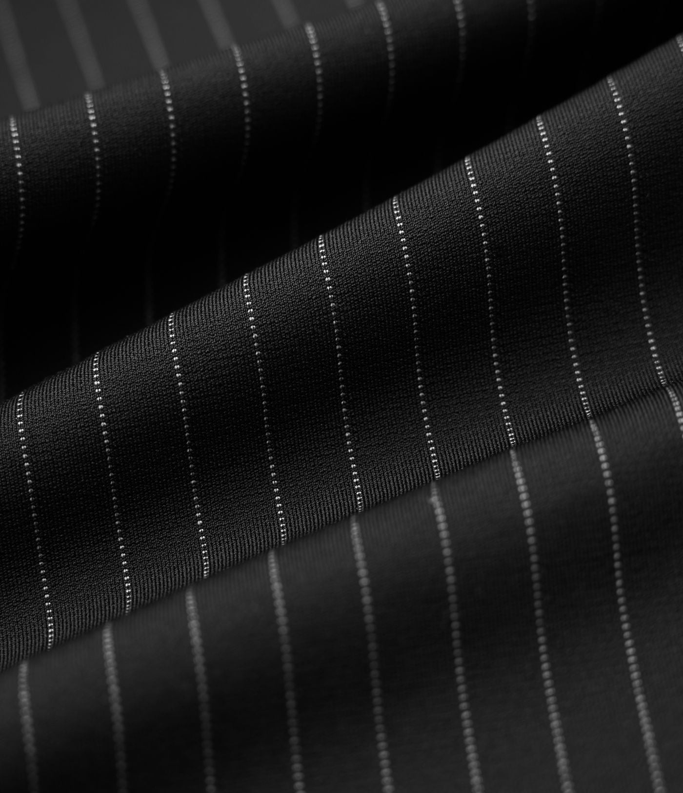 Pantalon tailleur fuselé 7/8 taille haute à rayures avec poches
