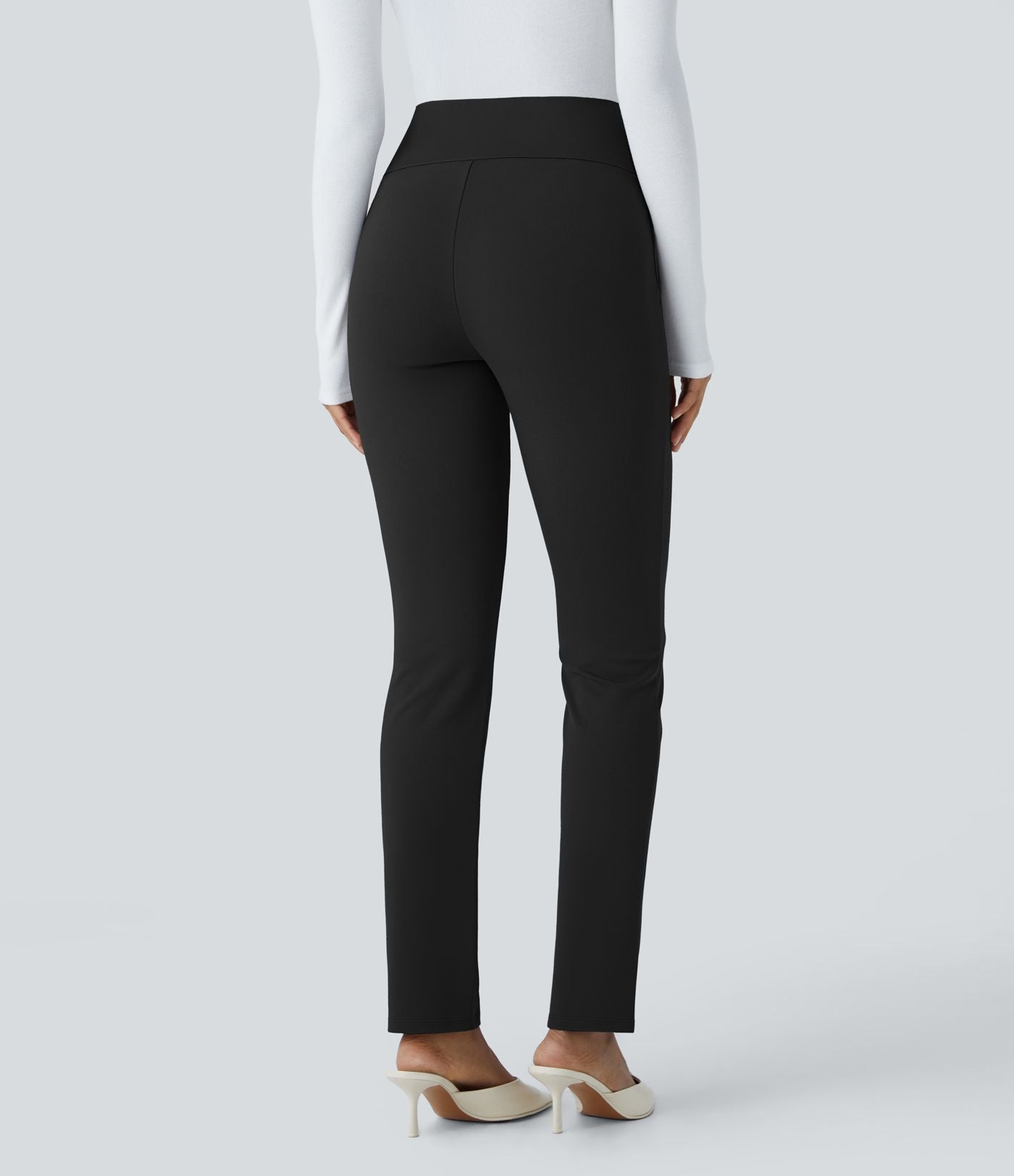 Pantalon ajusté taille haute avec poches décoratives
