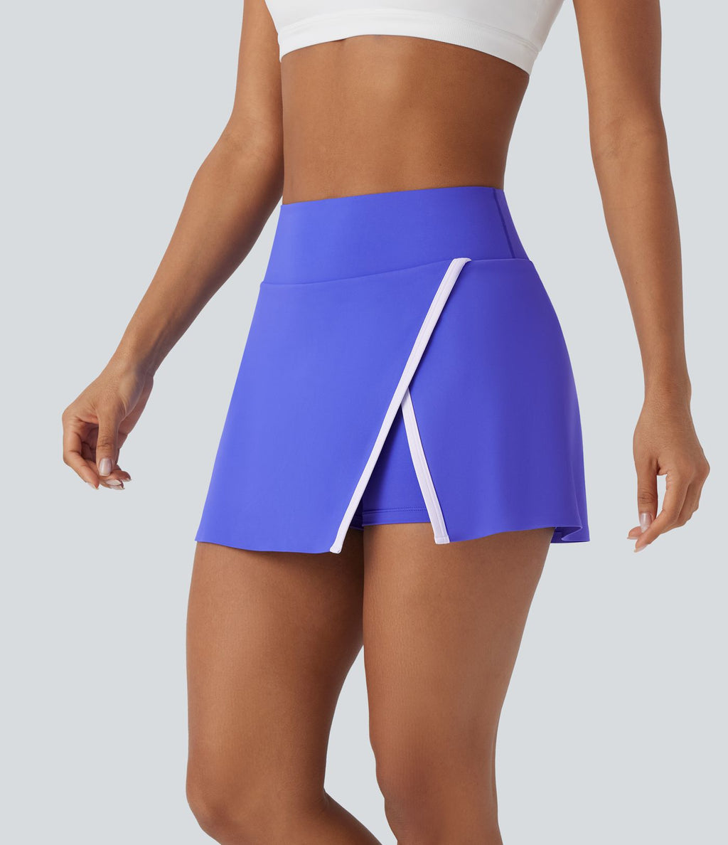 Jupe de tennis mini 2-en-1 à taille haute, fente, blocs de couleur et poche latérale