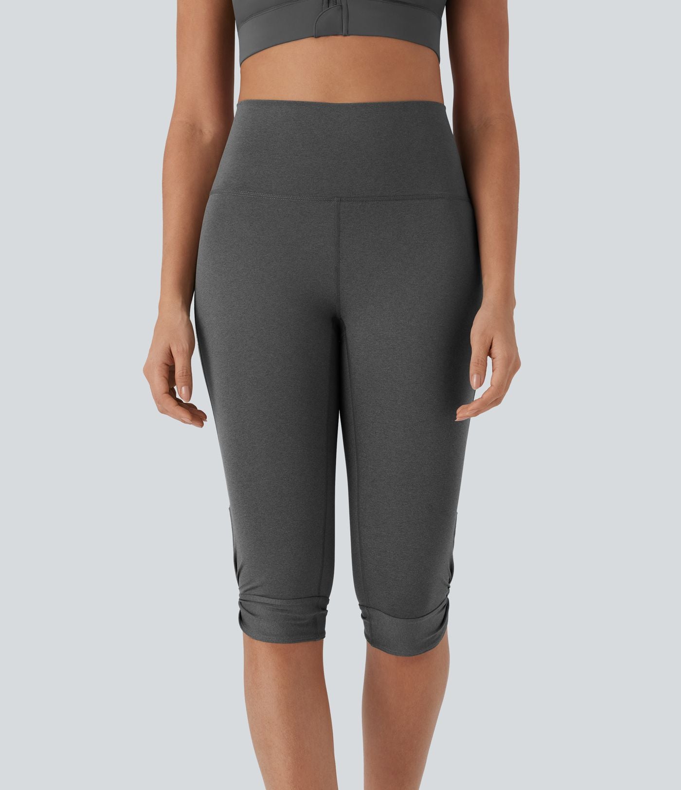 Leggings corsaire de yoga à taille haute, découpes, détails torsadés, séchage rapide et poche