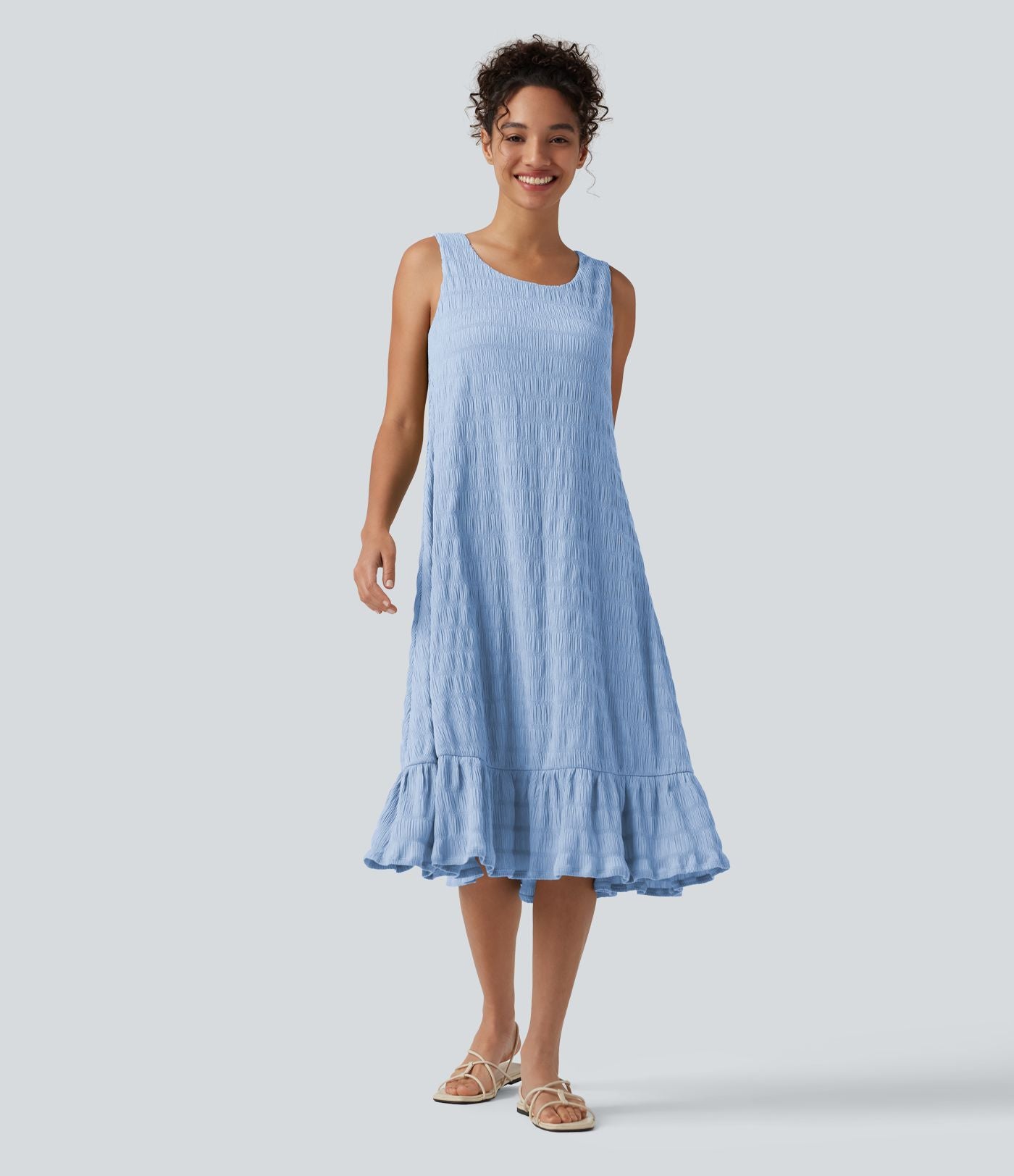 Robe midi sans manches à encolure arrondie avec coussinets amovibles et ourlet à volants