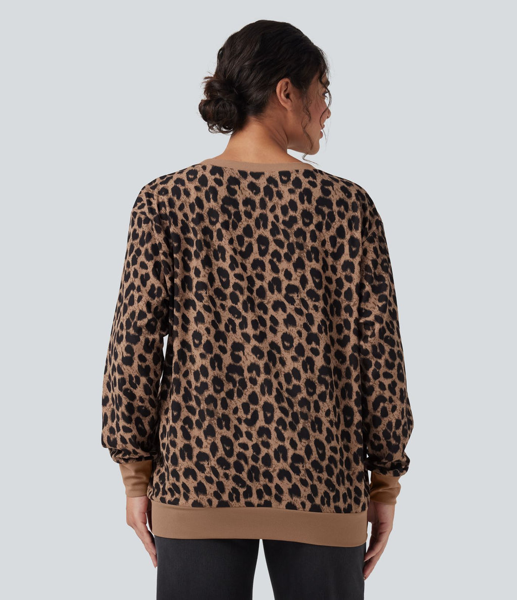 Sweat décontracté oversized col rond manches longues maille gaufrée léopard avec poches