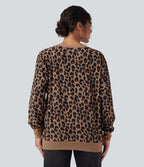 Sweat décontracté oversized col rond manches longues maille gaufrée léopard avec poches