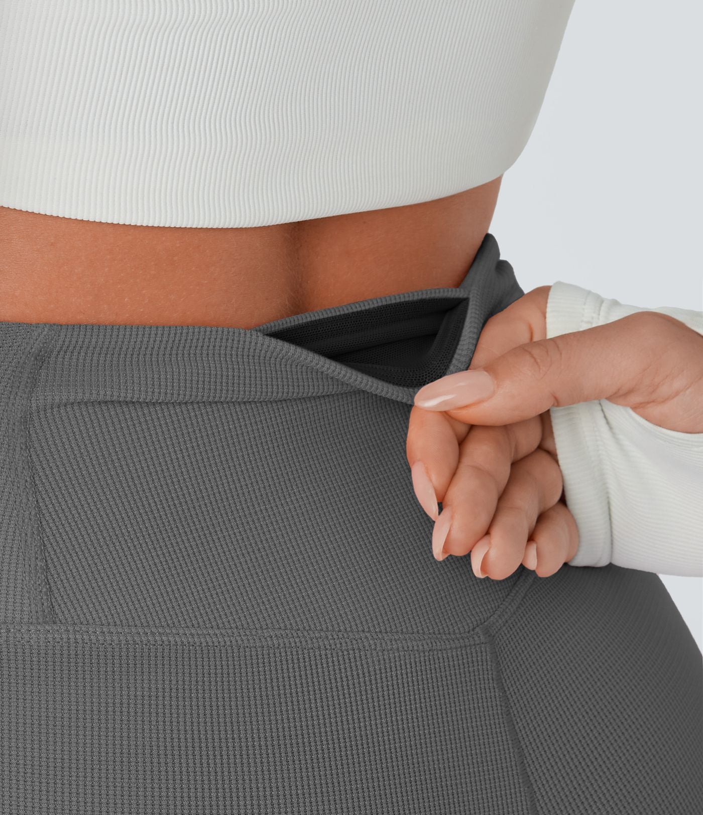 Pantalon décontracté évasé en maille gaufrée, taille haute, avec poches croisées