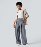 Pantalon tailleur large, taille haute, à poches