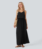 Robe longue fluide type nuisette à bretelles ajustables avec poches