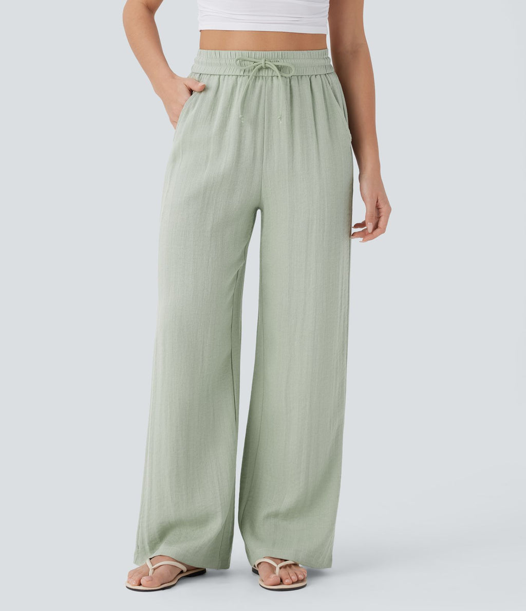 Pantalon large fluide taille haute avec cordon de serrage, poches latérales et aspect lin