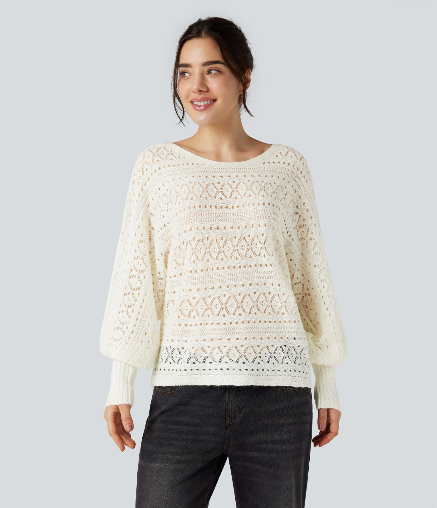Pull ajouré col rond manches chauve-souris longues