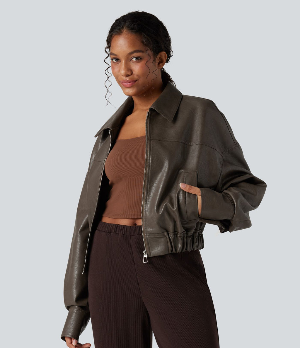 Veste décontractée en tissu enduit à fermeture éclair et manches longues avec poches