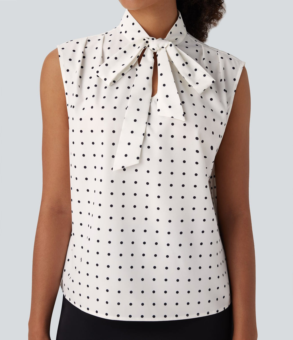 Chemise de travail sans manches à pois avec nœud devant