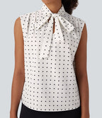 Chemise de travail sans manches à pois avec nœud devant