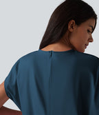 Robe de sport mini de yoga SoftlyZero™ Airy 2-en-1 effet frais InstantCool col rond à manches courtes, demi-zip et poches, accès facile Easy Peasy