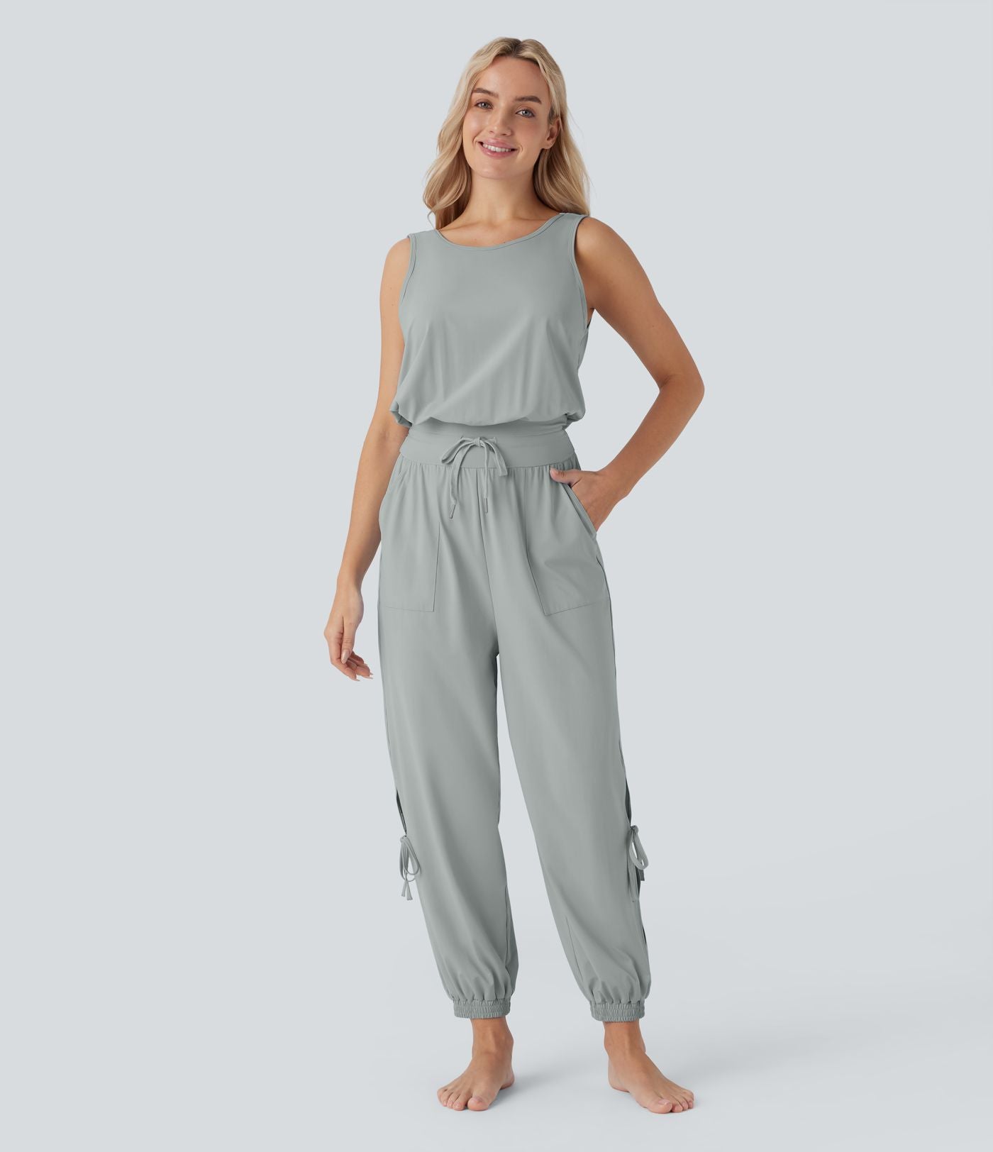 Combinaison de yoga col bateau sans manches dos nu avec découpes et poches latérales à cordon de serrage effet frais InstantCool, protection solaire UPF50+