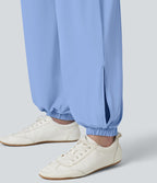 Jogging de sport taille haute effet frais InstantCool avec cordon de serrage, fentes, poches et séchage rapide, protection solaire UPF50+