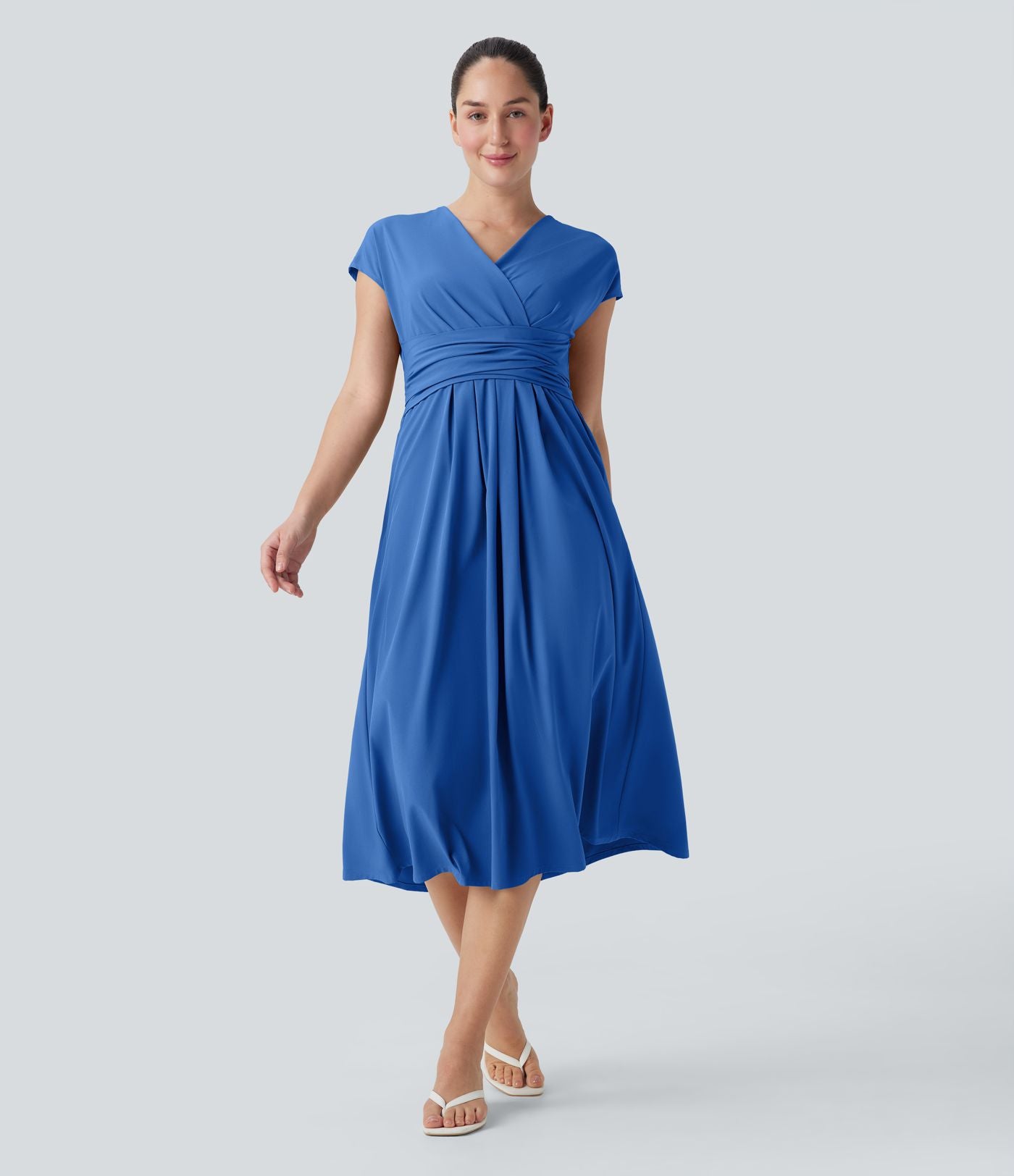 Robe midi Breezeful™ col V manches courtes à liens dans le dos séchage rapide avec poches latérales