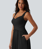 Robe midi fluide sans manches dos croisé, avec brassière intégrée (Bonnets E-G) et poches