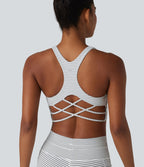 Brassière de sport yoga à rayures dos nageur croisé maintien léger avec soutien-gorge intégré