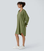 Robe Sweatshirt Casual à Capuche avec Cordon Poches Latérales Ourlet Courbé Asymétrique Oversize Mini en Tissu Gaufré