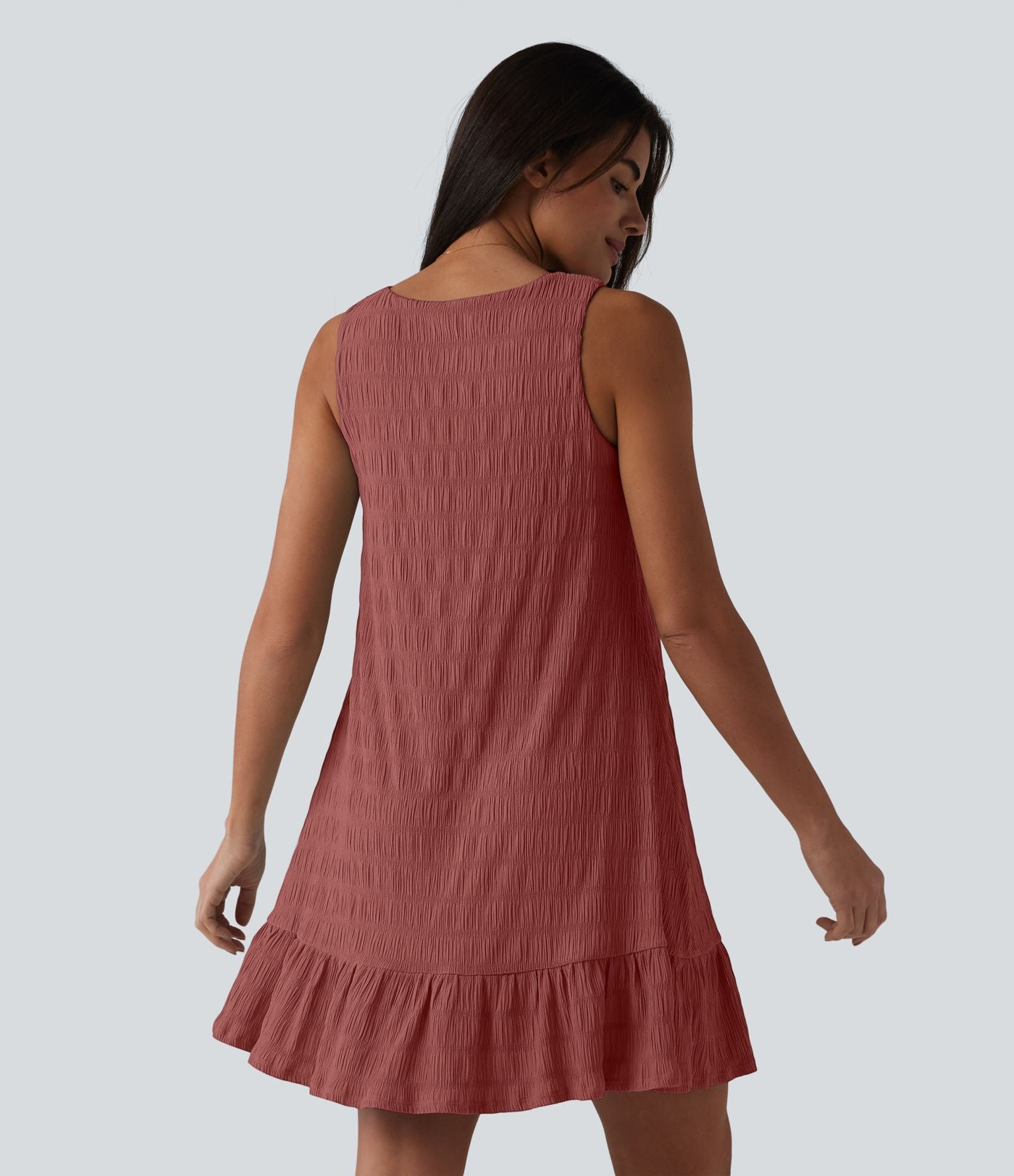 Robe courte décontractée sans manches à col rond, soutien-gorge intégré et ourlet à volants