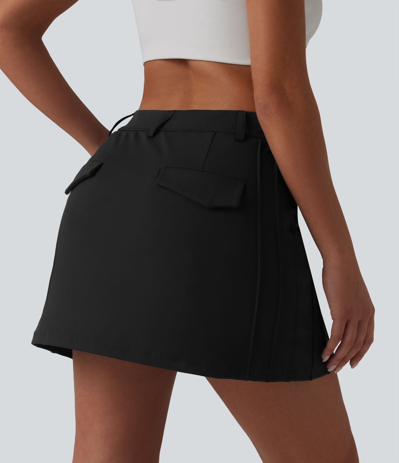 Jupe mini trapèze de golf 2-en-1 taille mi-haute avec poches
