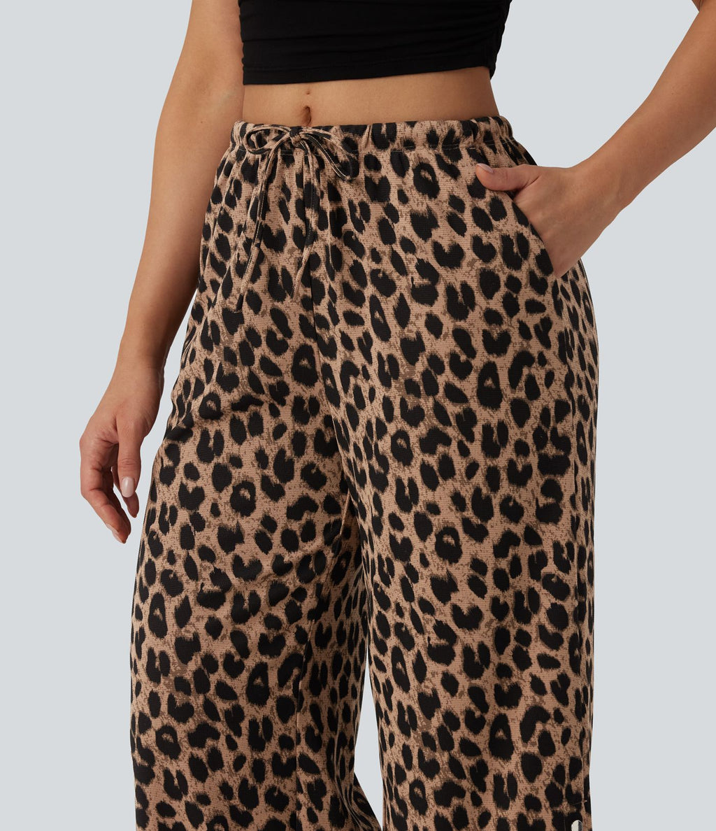 Pantalon large casual en maille gaufrée imprimé léopard taille mi-haute avec cordon de serrage et poches