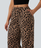 Pantalon large casual en maille gaufrée imprimé léopard taille mi-haute avec cordon de serrage et poches