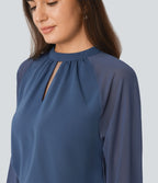 Blouse de travail à col montant avec dos ajouré, manches raglan et empiècements en mesh contrastant