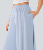 Pantalon fluide et ample avec superposition en mesh, poches latérales et taille haute