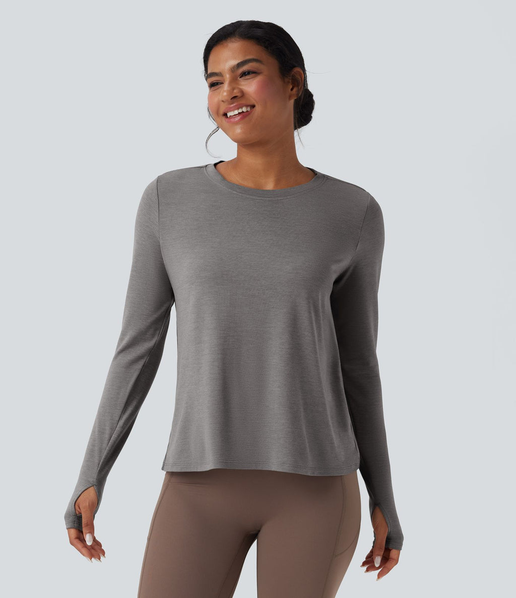 Haut de sport yoga dos nu manches longues avec trous pouces