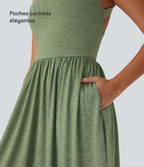 Robe longue fluide fendue avec poches latérales, dos nu et effet torsadé