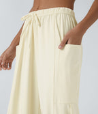 Pantalon Large Fluide Taille Mi-Haute Taille Élastique Cordon Poches Latérales Ourlet Flottant