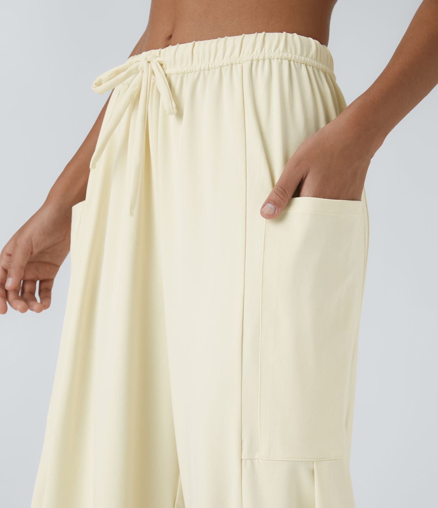 Pantalon Large Fluide Taille Mi-Haute Taille Élastique Cordon Poches Latérales Ourlet Flottant