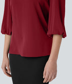 Blouse de travail col bateau avec manches évêque et dos ajouré