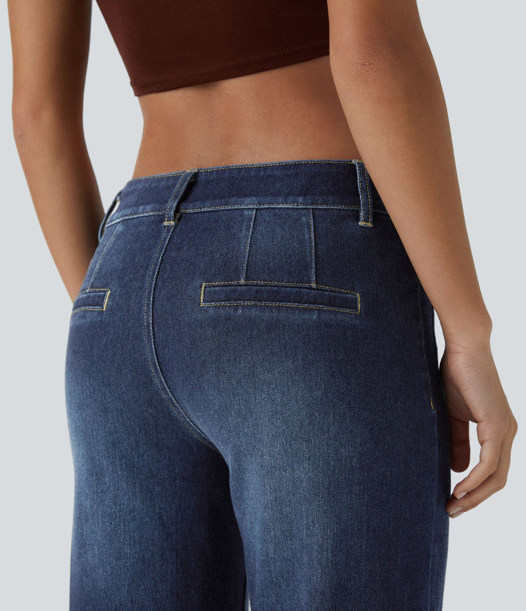 Jean décontracté délavé taille basse en maille extensible, coupe droite avec poches avant et fermeture zippée