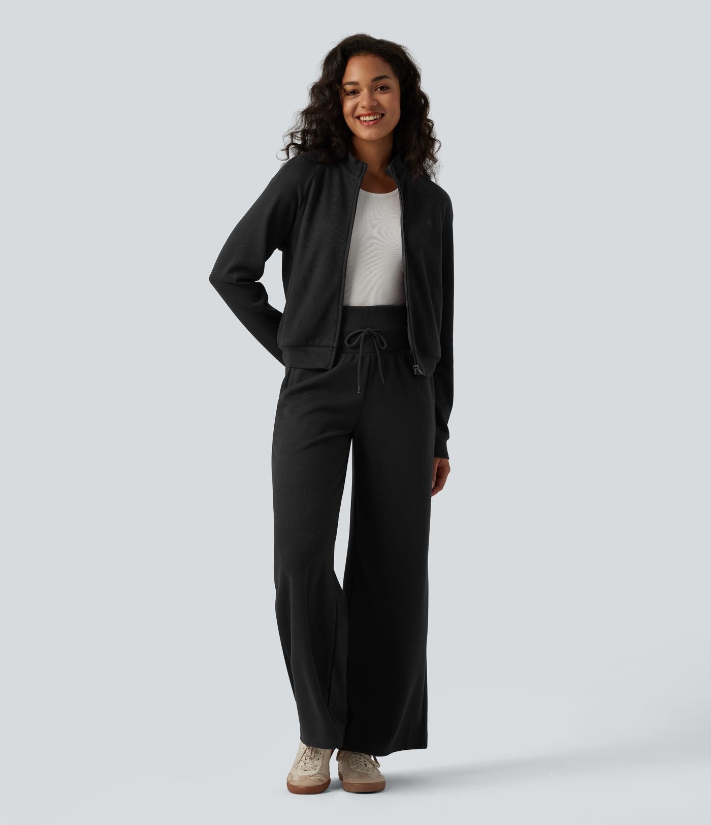 Veste casual côtelée à col montant, manches longues et fermeture zippée avec poches
