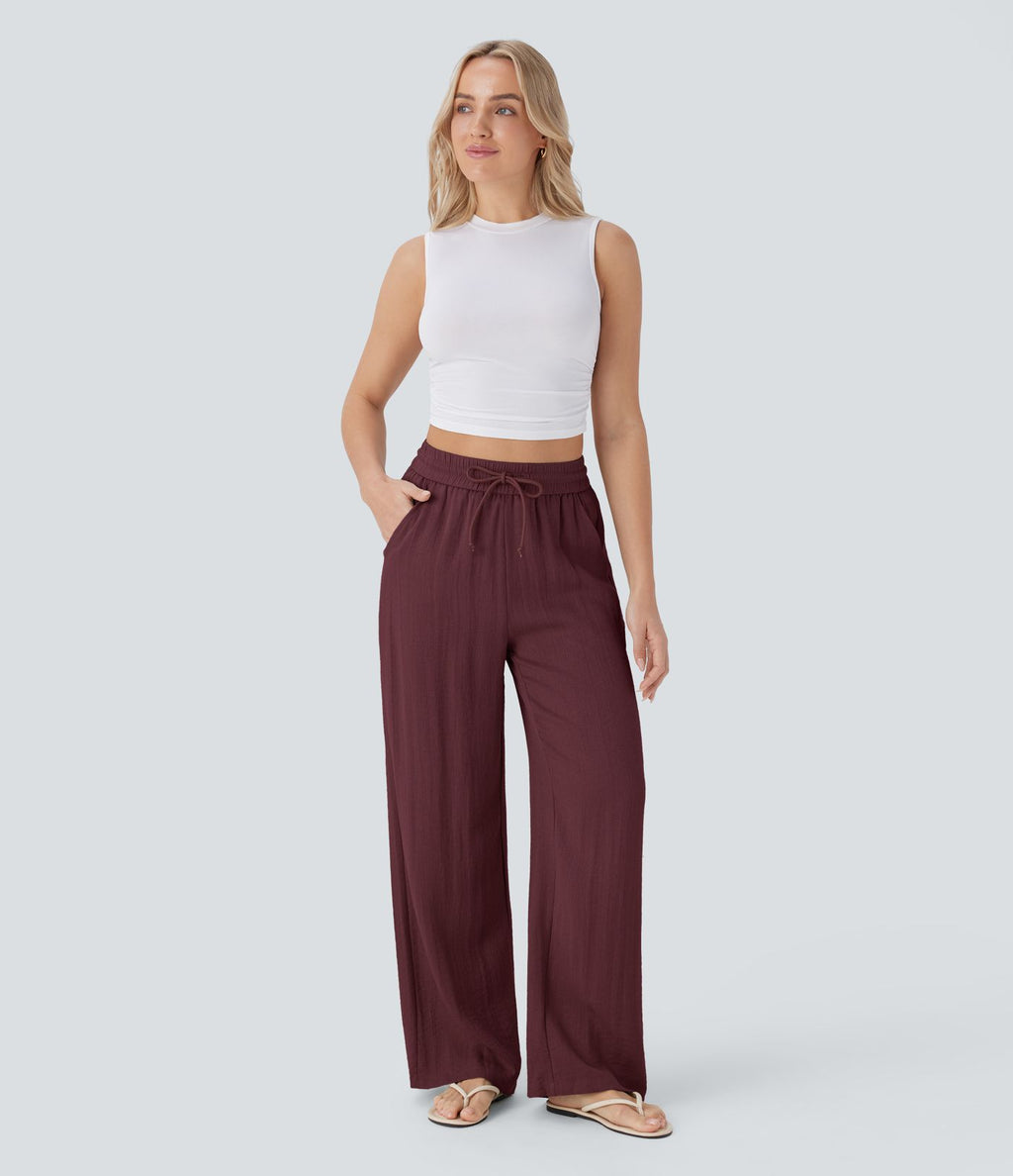 Pantalon large fluide taille haute avec cordon de serrage, poches latérales et aspect lin