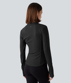 Haut de sport yoga polaire col montant demi-zip à manches longues avec passants pouces