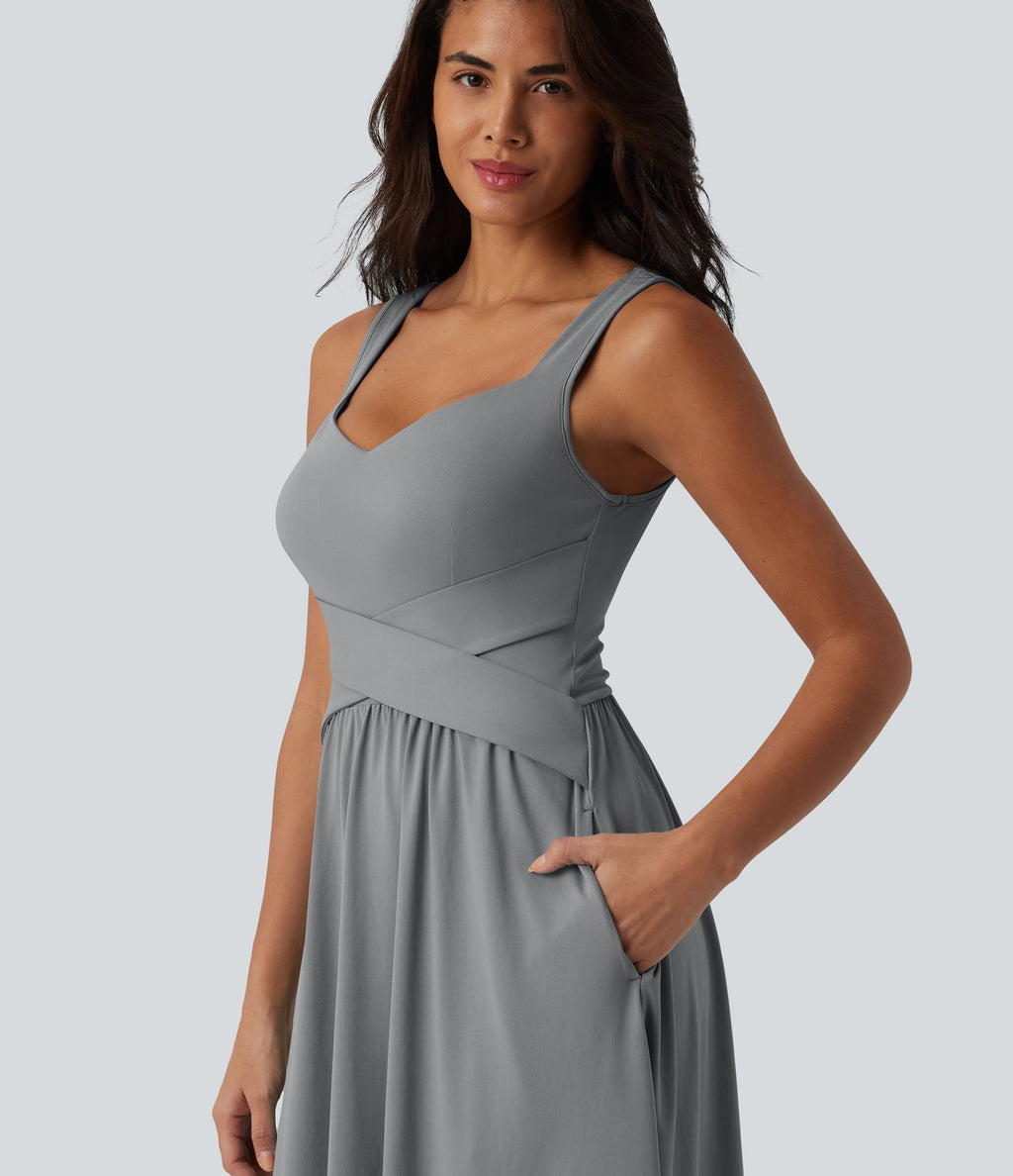 Robe midi fluide sans manches dos croisé, avec brassière intégrée (Bonnets E-G) et poches